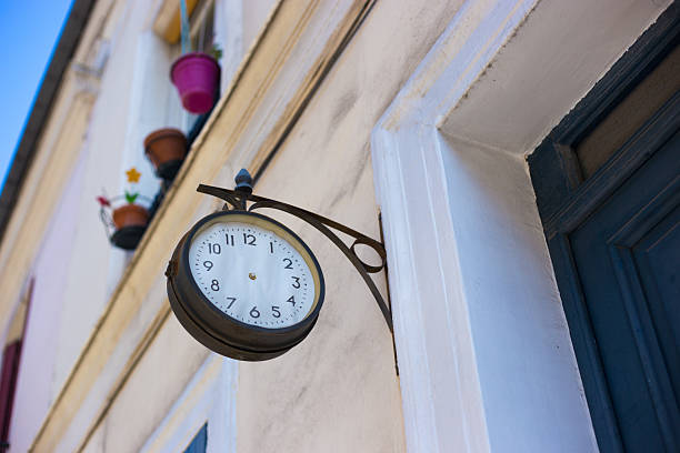 Paris, France: Old Clock Hangs on Rue Cremieux, 12th Arrondissement