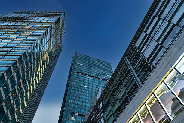 istock Refection of buildings on a skyscraper facade 2208865214