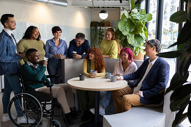 istock Multiracial and multigenerational colleagues enjoying coffee break in coworking space 2208866826