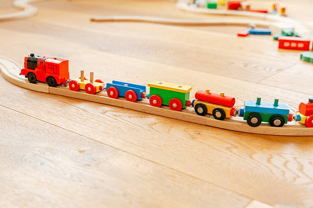 istock Colorful Wooden Toy Train on Curved Track 2208871843
