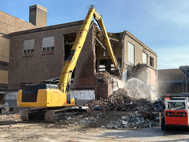 istock Dusty Demolition Scene with Excavator Machine 2208875352
