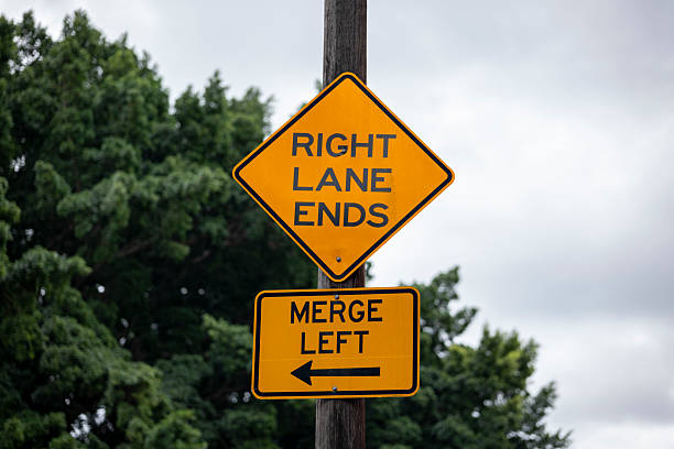 Lane ends and merge directional signs