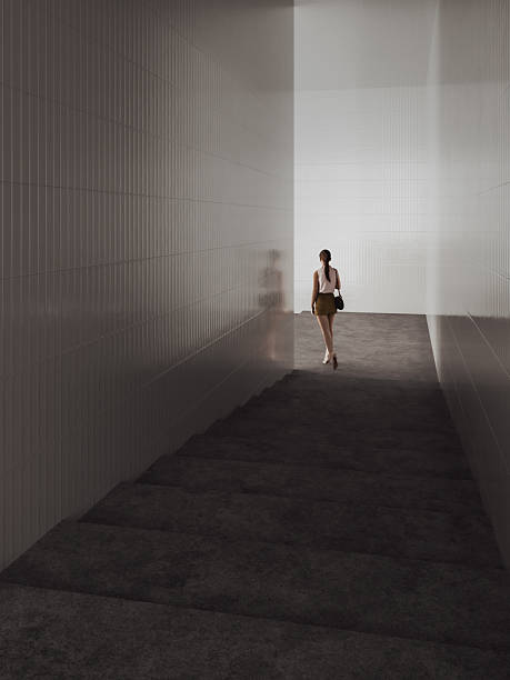 istock Woman walking in street passage 2208884238