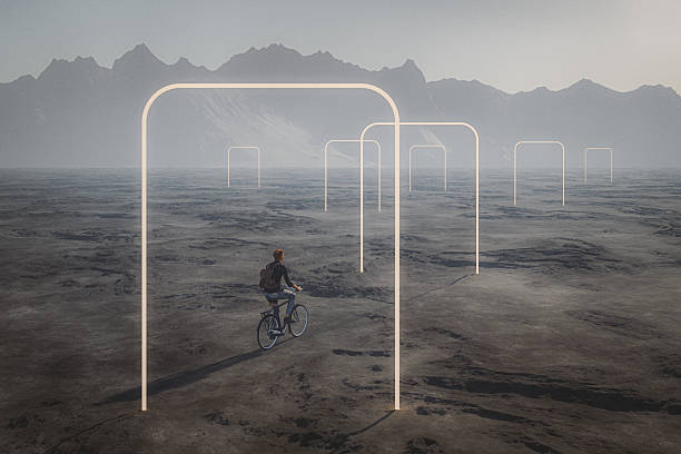 istock Young man cycling in fantasy landscape 2208884340