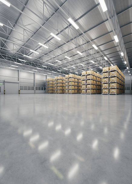 3d rendering of warehouse industry building interior. known as distribution center, retail warehouse. Included cardboard box on shelf, empty space on concrete floor suit for industrial background.