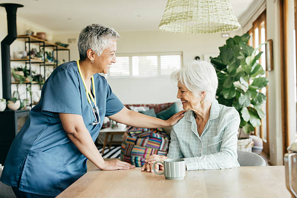 istock Home Care at Its Best: Nurse Providing Comfort 2208896965