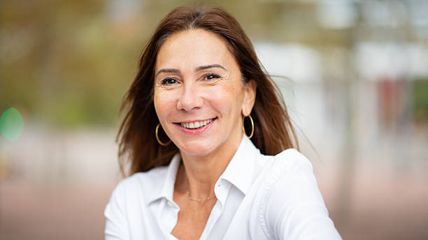 istock woman with a genuine smile looking at camera 2208897860