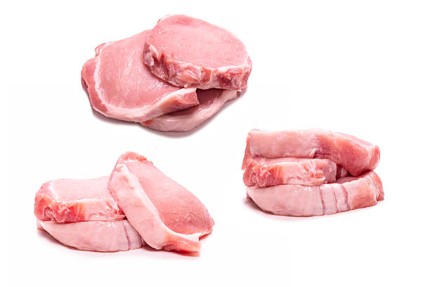 istock Raw pork pieces isolated on a white background. 2208910494