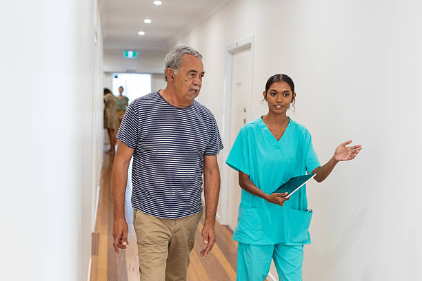 istock Australian Aboriginal Medical Staff Assisting Patients 2208914855