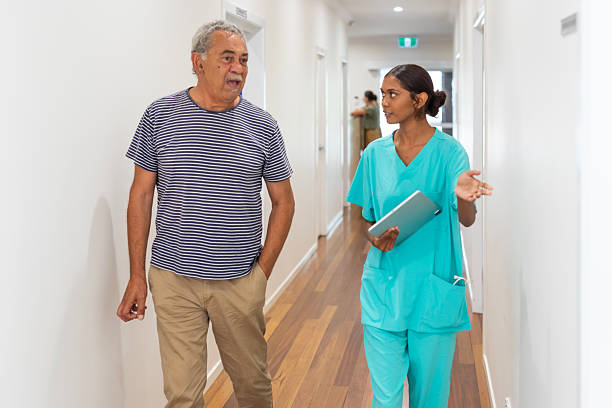 istock Australian Aboriginal Medical Staff Assisting Patients 2208914891