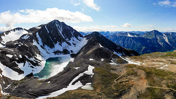 istock Summer time scenery in aerial view taken in Yukon Territory, Canada at Paddy Peak. Drone nature scenic landscape, background, wallpaper. 2208918921