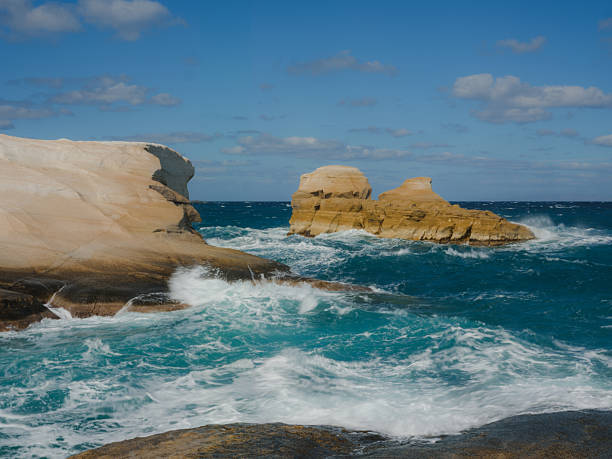 Sarakiniko beach with crashing waves, Milos, Greece