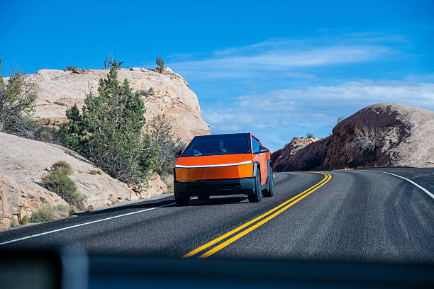 Road Trip! Fisheye Lens Perspective Driving through the red sandstone cliffs of Moab, Utah
