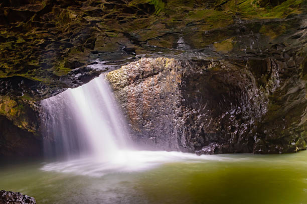 istock Natural Bridge in Springbrook National Park with waterfall. 2208920242