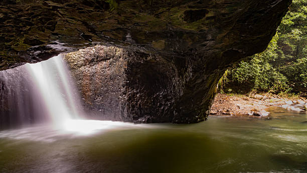 istock Natural Bridge in Springbrook National Park with waterfall. 2208920268