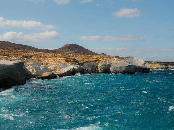 Sarakiniko beach with crashing waves, Milos, Greece