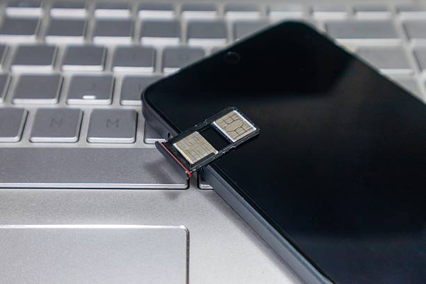 istock An open SIM card slot on a smartphone 2208925622