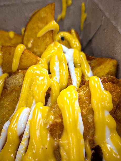 istock A close up of potato wedges. 2208927673