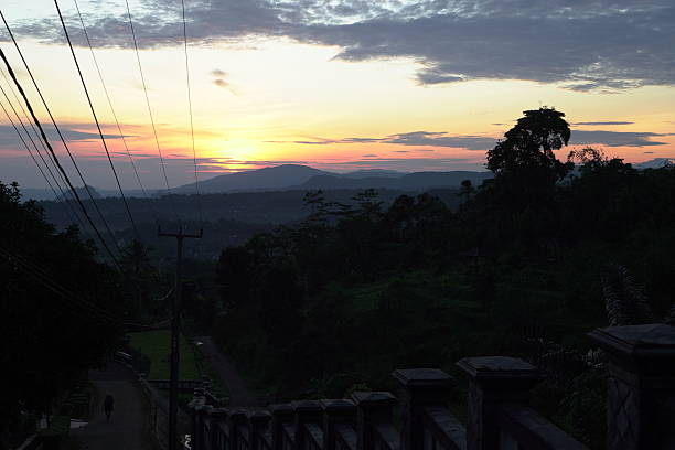 istock A colorful sunrise or sunset illuminates the sky 2208928097