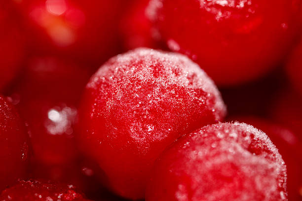 Red cherries isolated on a white background.
