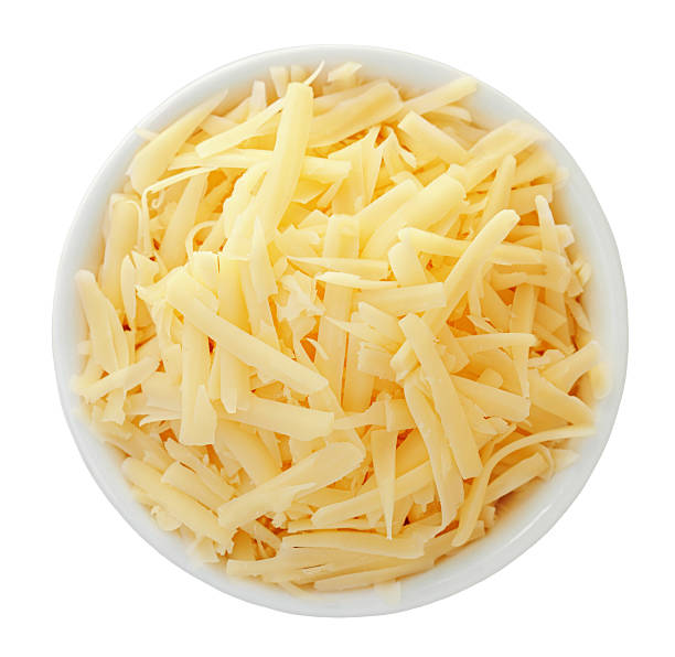 istock Flying Emmental cheese cubes isolated on white background. Falling  maasdam cheese for cooking. Top view. Flat lay  2208932281