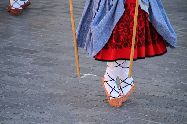 istock Traditional Folk Dancer's Feet on Cobblestone 2208932500