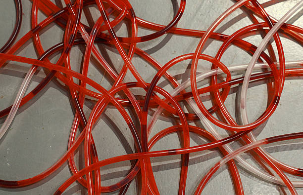 istock The red liquid flows through the transparent tube. 2208936094