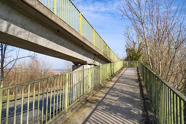 Concrete footbridge over the highway
