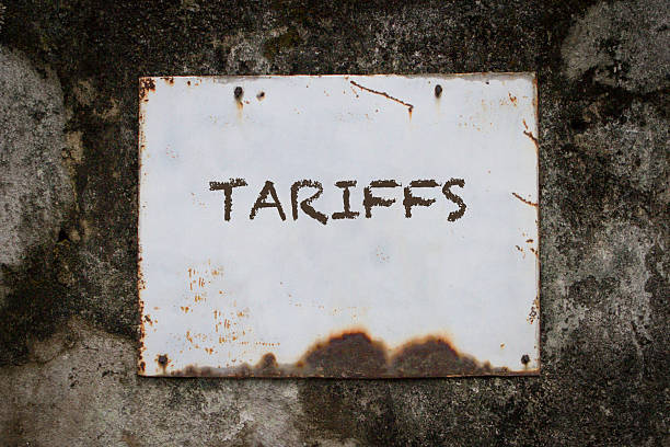 istock Tarrifs, word on a grunge metal board. 2208938456