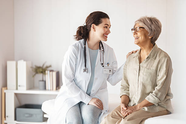 istock patient with a doctor in medical office 2208940928