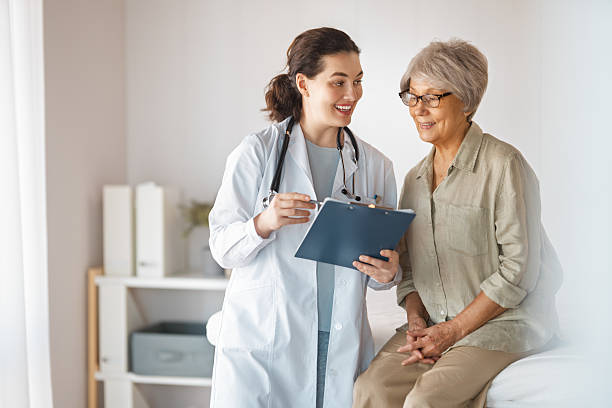 patient with a doctor in medical office