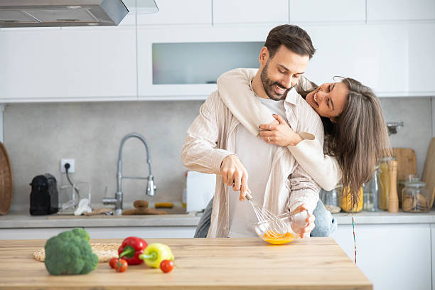 istock Intimate Cooking Scene with Couple at Home 2208941656