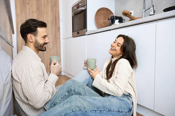 istock Happy Couple Enjoying Coffee Together 2208941717
