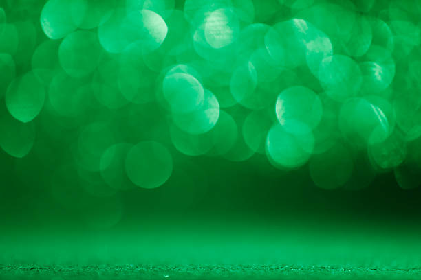 istock Fancy green glitter sparkle background. Defocused green sequin light. 2208943026