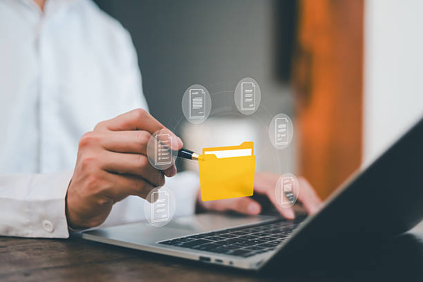 istock Businessmen review contract documents, manage documents and agreements, sign contracts and business cooperation, have an efficient accounting document system without using paper. 2208949752