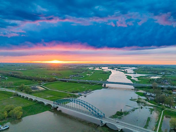 istock Amazing colorful sunset over the river IJssel 2208957552