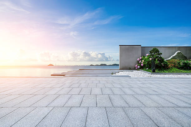 istock Empty square floor and beautiful coastline natural scenery under blue sky 2208958618