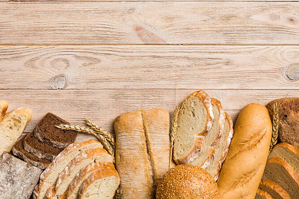 istock Homemade natural breads. Different kinds of fresh bread as background, top view with copy space 2208958840