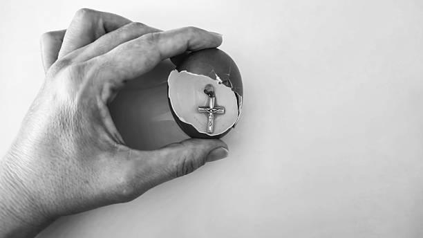 istock For Easter, the Easter Eggs have been cracked open and inside is a golden Jesus Cross 2208962290
