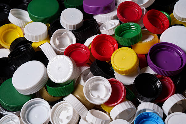 istock Lots of colorful plastic bottle caps. 2208987804
