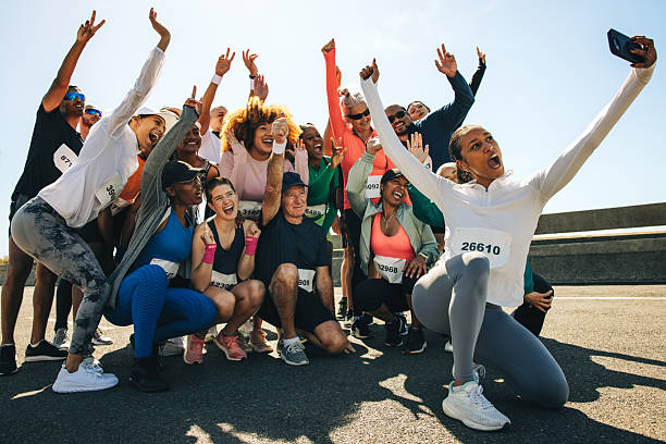istock Group of runners taking a cheerful selfie after community run 2208989249