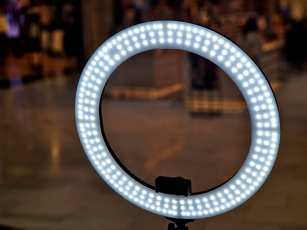 istock ringlight with remote control and as a gift a very robust tripod and smartphone holder. light is ideal for photo shoots, online streaming, interviews in front of camera. castings and video shooting 2208996495