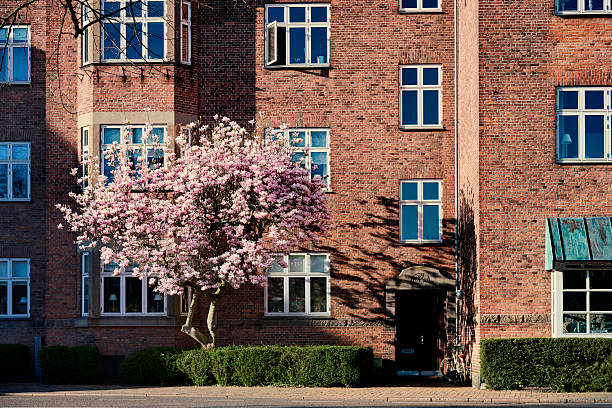 Brick build tall estate in springtime