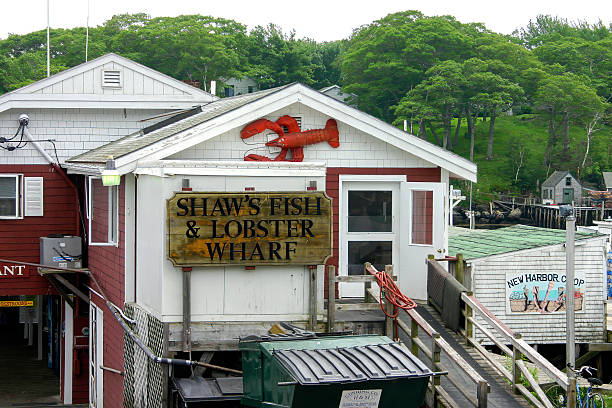 New Harbor, Maine, USA - June 24, 2006: Shaw’s Fish and Lobster Wharf is a popular seafood restaurant on one of the most picturesque Maine \