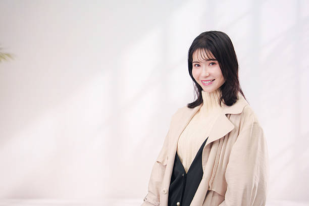 istock Young woman in high neck knit 2209010526