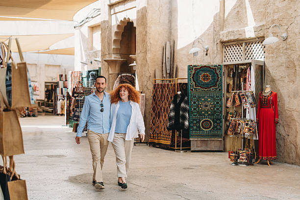 istock Tourists walking in the Old Dubai Souk market 2209014624