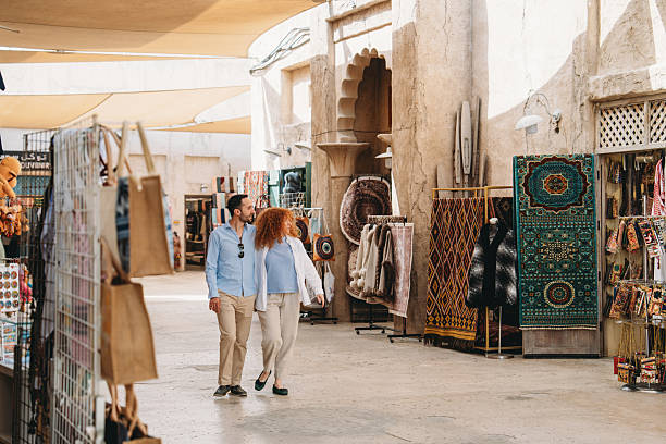 Tourists walking in the Old Dubai Souk, United Arab Emirates