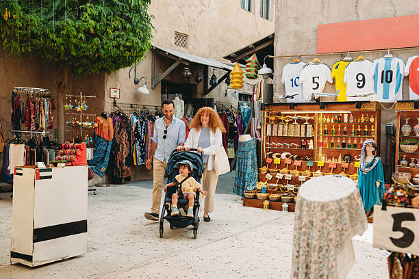 istock Family strolling through the vibrant Old Dubai souk 2209014718
