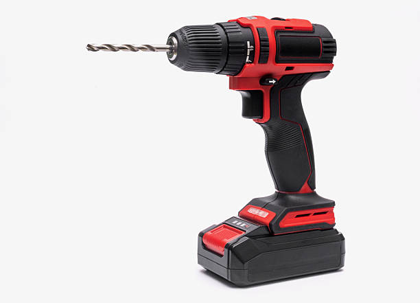 istock an electric cordless screwdriver with a drill. isolated on a white background. 2209016230
