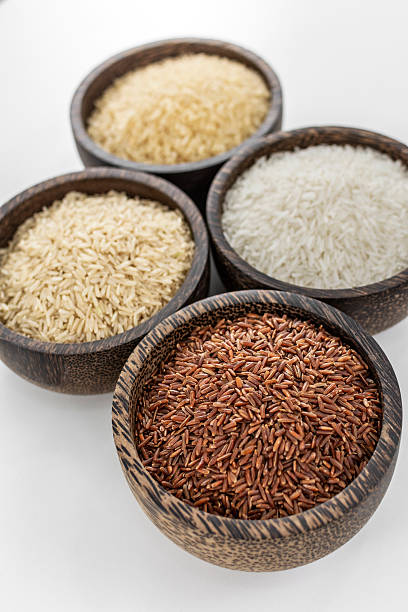 istock different kinds of asian rice grains in bowls on white background 2209018290